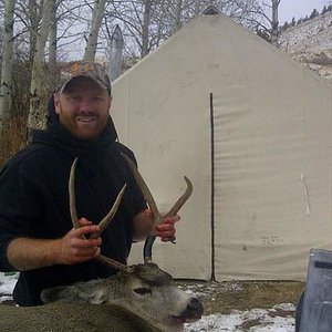 Me and my buck back at camp.