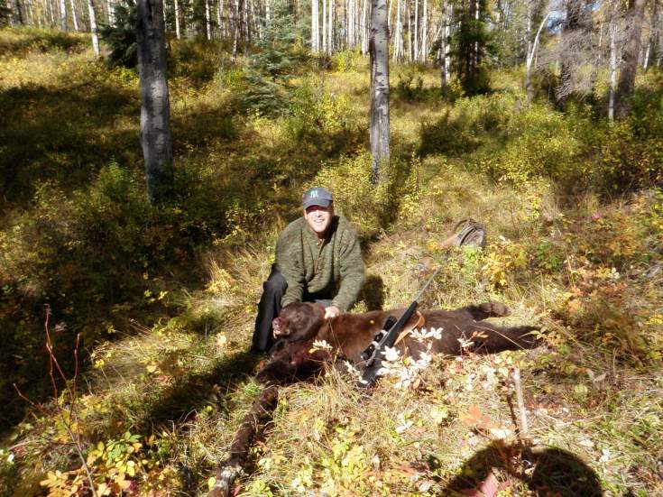 My first bear ever, shot in a huckleberry patch near Kluskoil Lake, BC